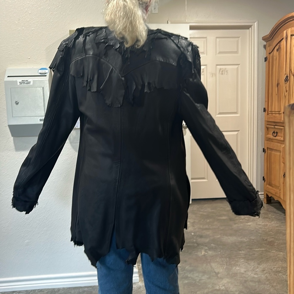 Men’s genuine custom deer hide jacket with custom turquoise and silver buttons.